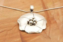 Artie Yellowhorse Sterling Silver Flower Pendant
